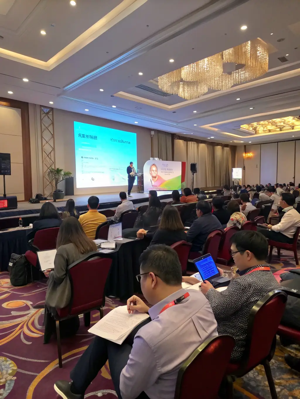An image of professionals attending a seminar on industry best practices, highlighting knowledge sharing and networking opportunities.